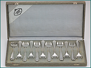 12 zilveren oestervorken model antiek filet 1925-1953