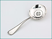 Zilveren natfruitlepel met parelrand 1906-1924