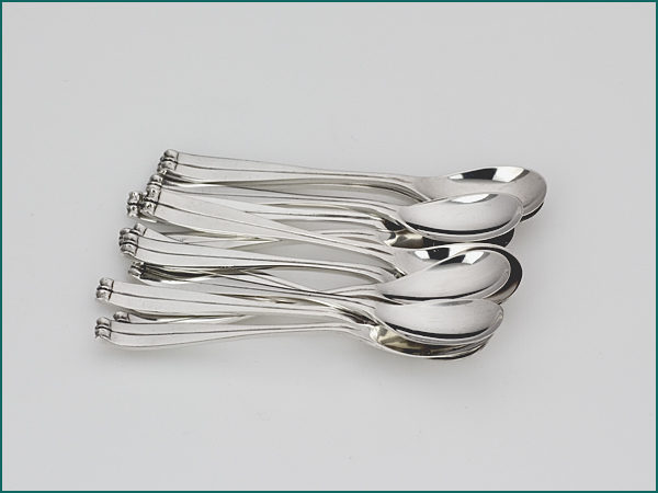 12 zilveren mokkkalepels 1943-1953-0