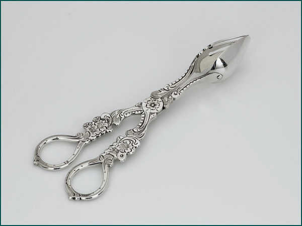 Zilveren zuur/komkommertangetje uit 1871-0