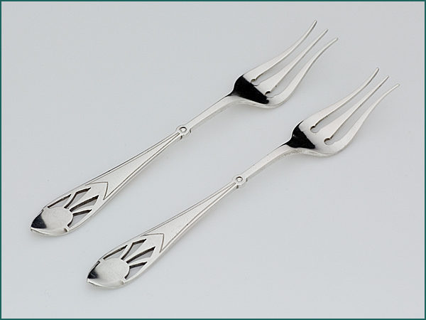 Een stel zilveren zuurvorkjes 1906-1924-0