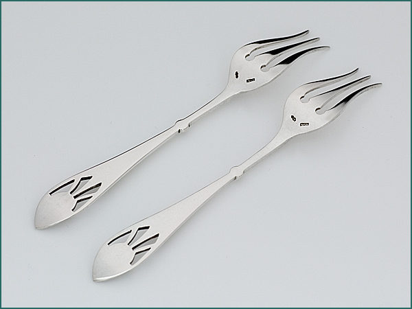 Een stel zilveren zuurvorkjes 1906-1924-7589