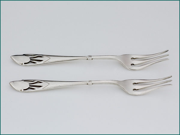 Een stel zilveren zuurvorkjes 1906-1924-7590