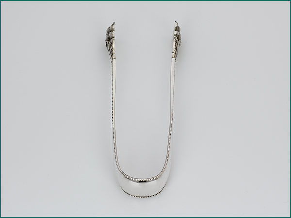 Zilveren (ijs)klontjestang uit 1886-7098