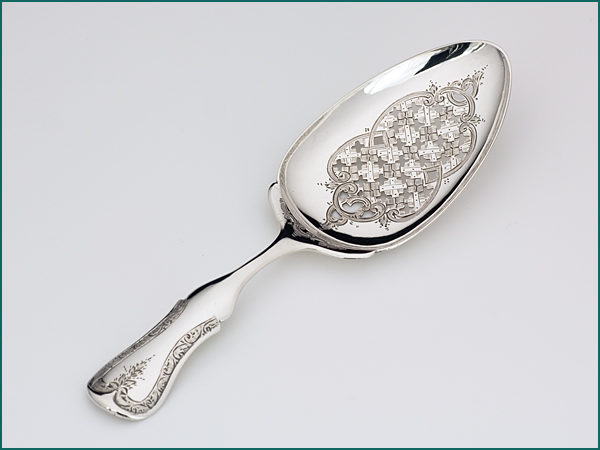 Zilveren natfruitschep met gravering uit 1880-0