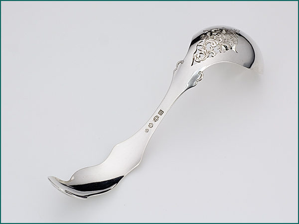 Zilveren natfruitlepel met gravering uit 1873-4501