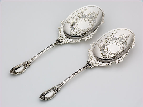 Een stel zilveren natfruitscheppen in etui uit 1899-8386