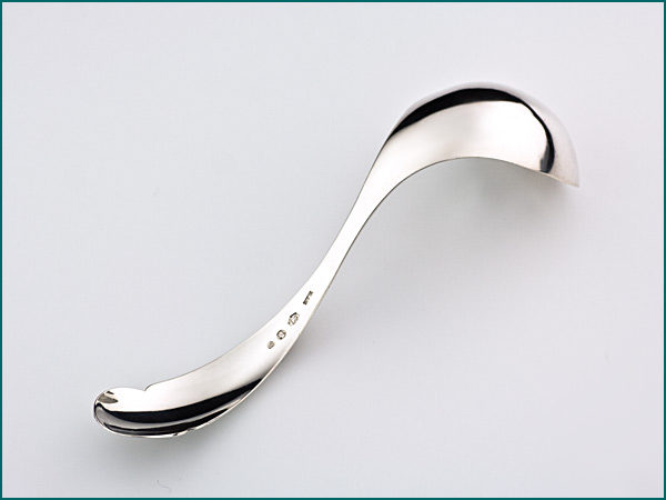 Zilveren compotelepel met gravering uit 1882-4471