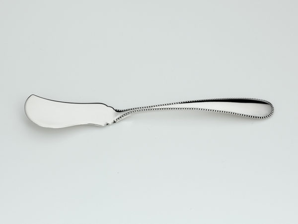 Zilveren boterspatel met parelrand uit 1906-13997